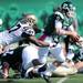 Eastern Michigan junior Alex Gillett attempts to out run Western Michigan junior Freddie Bishop during the second half against Western Michigan at Rynearson Stadium on Saturday afternoon. Melanie Maxwell I AnnArbor.com